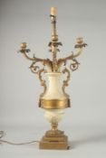 A 19TH CENTURY FRENCH WHITE MARBLE AND FOUR BRANCH ORMOLU LAMP on a square base. 29ins high.