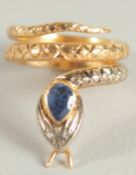 AN 18CT YELLOW GOLD, DIAMOND AND SAPPHIRE SET SNAKE RING.