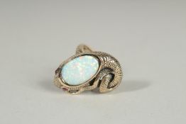 A 9CT GOLD OPAL AND RUBY SNAKE RING.