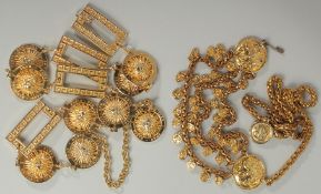 A VINTAGE EDOUARD GILT BELT, PARIS, NEW YORK, ROME, TOKYO.