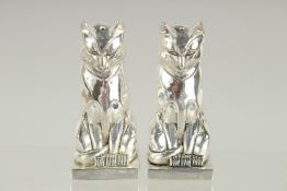 A PAIR OF ART DECO STYLE SILVER PLATED CAT SALT AND PEPPERS. 3ins high.