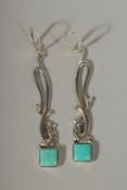 A PAIR OF SILVER ENAMEL AND CORNELIAN EARRINGS.