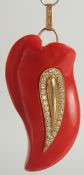 A GOOD CORAL, GOLD, DIAMOND SET, TEAR DROP PENDANT.