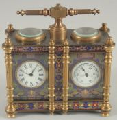 A DOUBLE CLOISONNE CLOCK AND BAROMETER with carrying handle.
