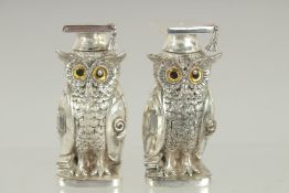 A PAIR OF ART DECO STYLE OWL SALT AND PEPPERS. 2.75ins high.