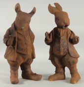 A PAIR OF CAST IRON BEATRIX POTTER FIGURES. 17ins high.