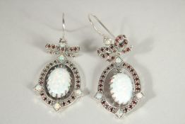 A PAIR OF SILVER OPAL AND GARNET DROP EARRINGS.