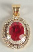 AN 18CT YELLOW GOLD RUBY AND DIAMOND OVAL PENDANT.