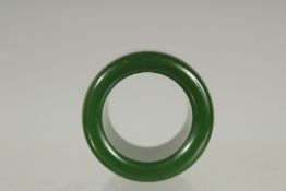 A CHINESE JADE ARCHERS RING.