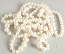 A LONG STRING OF PEARLS. 44ins long.