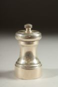 A SILVER PEPPER MILL. London 1965.