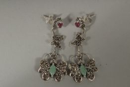A PAIR OF MARCASITE AND EMERALD BUTTERFLY DROP EARRINGS.