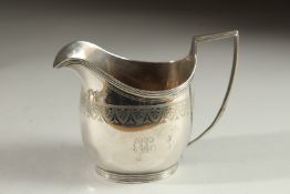 A GEORGE III SILVER MILK JUG. London 1804. Maker: I. B.