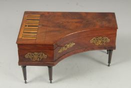 A SUPERB PIANO SHAPED VANITY BOX as a piano with lid to uplift and fitted interior with scissors,
