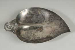 A TIFFANY STERLING SILVER LEAF SHAPE DISH.
