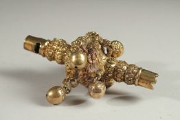 A GEORGE IV SILVER GILT BABY'S RATTLE AND WHISTLE by CHARLES RAWLINGS, London, 1823.