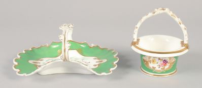 TWO 19TH CENTURY ROCKINGHAM OVER-HANDLED BASKETS painted with two panels of flowers on a green