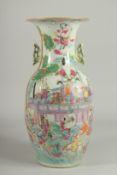 A GOOD CANTON VASE painted with many figures. 17ins high.