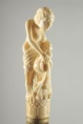 A BONE HANDLE WALKING STICK 'YOUNG GIRL'