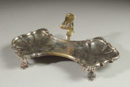 A GOOD GEORGE II SILVER SNUFFER TRAY, with shell mounts on four pad feet. 7.5ins long. London