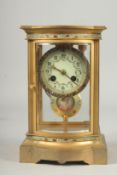 A GOOD 19TH CENTURY FRENCH BRASS AND CHAMPLEVE ENAMEL , FOUR GLASS CLOCK with a superb pendulum,