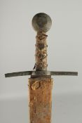 A GERMAN SWORD in a leather scabbard with brass handle. Inventory No. 10.1300. 39ns long.