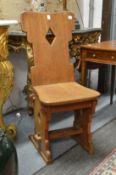 A PAIR OF ARTS AND CRAFTS GOTHIC REVIVAL WALNUT SIDE CHAIRS.