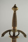 A GERMAN SWORD in a leather scabbard with brass handle. Inventory No. 10.1257. 40ins long.