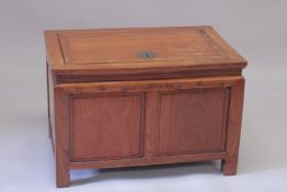 A CHINESE HARDWOOD CHEST with lift up top. 2ft 10ins long, 1ft 10ins deep, 1ft 10ins high.