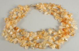 A CITRINE THREE ROW NECKLACE.