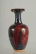 A CHINESE PURPLE SPLASH VASE 8.5ins high.