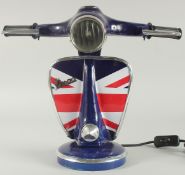 A DARK BLUE VESPA LAMP.