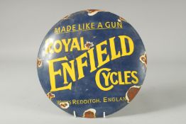 A ROYAL ENFIELD ENAMEL SIGN. 12ins diameter.