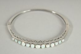 A SILVER OPAL SET BANGLE.
