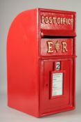 A RED TIN REPLICA POST BOX. 25ins high.