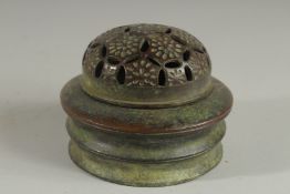 A CHINESE CIRCULAR BRONZE CENSER AND COVER 5ins diameter.