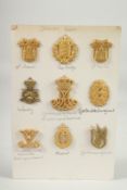 A collection of nine Danish army badges.