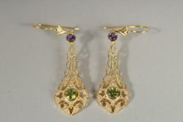 A PAIR OF SILVER GOLD PLATED AMETHYST, PERIDOT, AND PEARL DROP EARRINGS.