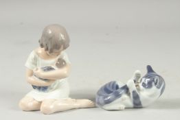 A COPENHAGEN PORCELAIN GROUP OF A YOUNG GIRL WITH A DOLL. Pattern, 1932, 5ins high and A SLEEPING