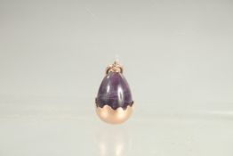 A 14CT GOLD RUSSIAN AMETHYST EGG PENDANT.