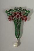A SILVER PLIQUE A JOUR PEARL SET BROOCH.