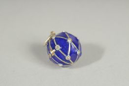 A SILVER BALL SHAPED BLUE ENAMEL, LOCKET.