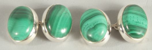 A PAIR OF SILVER AND MARCASITE CUFF LINKS.