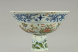 A CHINESE PORCELAIN COLOURED STEM CUP. Mark in blue. 6.75 diameter.