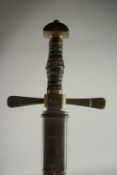 A SWORD WITH LEATHER HANDLE in a leather sheath.