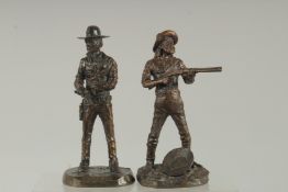 A GOOD SMALL PAIR OF BRONZE COWBOYS, inscribed. 6ins.