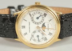 A SUPERB AUDERMARS PIGUET 18CT GOLD WATCH, sun and moon dial. No. C 18357 in original box.