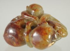 A CHINESE CARVED JADE MONKEY AND PEACH. 2.75ins.