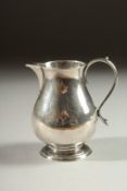 A GEORGE II SILVER CREAM JUG. London 1730, maker: William Darker.