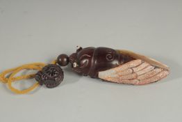 A LARGE JAPANESE CARVED WOOD AND MOTHER OF PEARL DRAGONFLY INRO. 5ins.